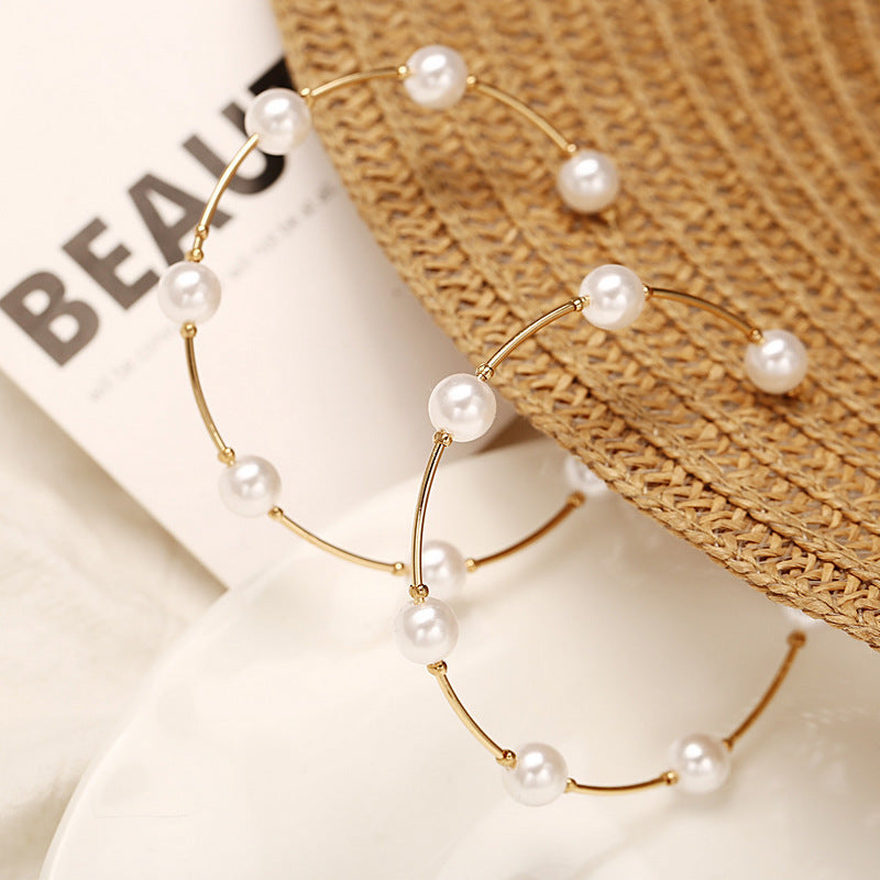 Pearls wrapped around ear rings - HJG